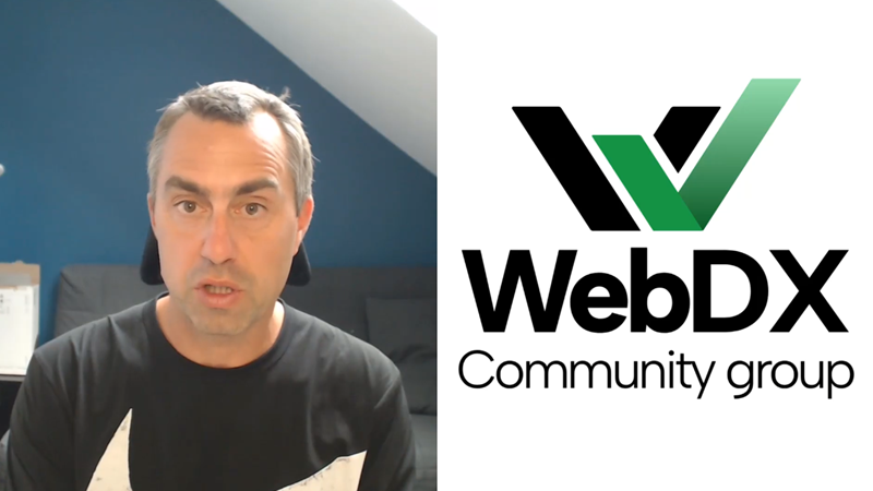 Me, speaking in front of the camera, next to the title slide which reads: WebDX Community Group.